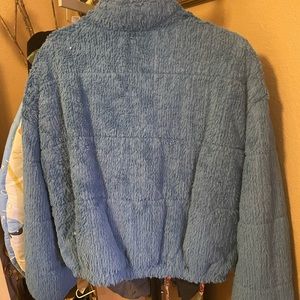2 light blue and pinks jackets.